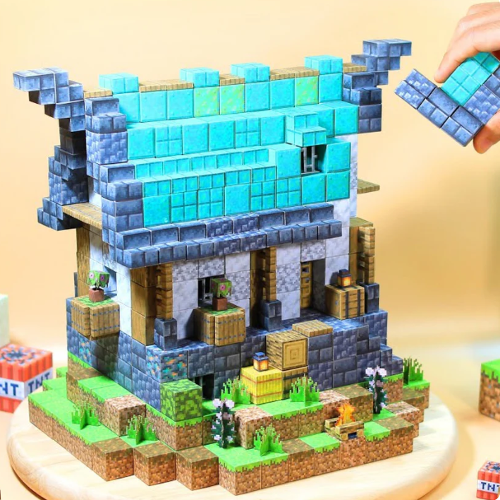 ¿Y si tu hijo construyera SU propio mundo pixelado... sin pantalla? 🎮✨